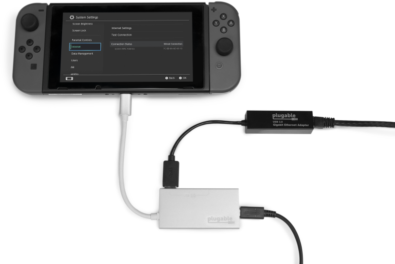 A Couple Of Network Adapters And Usb Type C To Type - Nintendo Switch Hdmi Adapter (800x568), Png Download