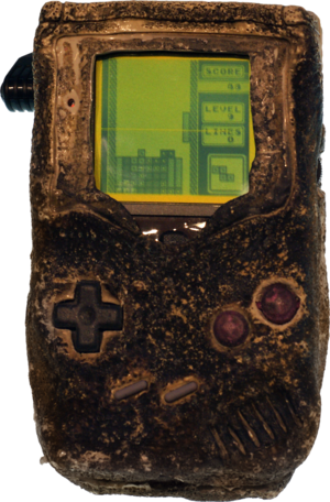 The Game Boy Damaged In The Gulf War Running Tetris - Game Boy That Survived The Gulf War (300x456), Png Download