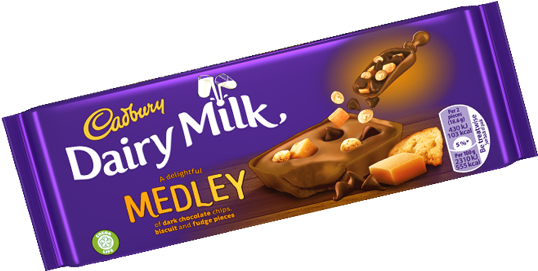 A Velvety Smooth Chocolate Flavoured Filling, Topped - Dairy Milk Medley Fudge (600x294), Png Download