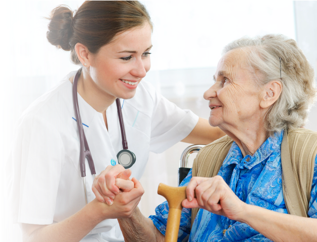 Caregiver Helping Her Patient To Get Up - Nursing Home Nurses (960x490), Png Download